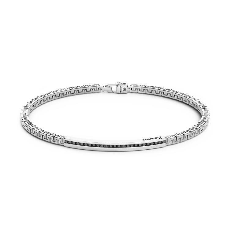 Pulsera Zancan de plata con placa y piedras negras.