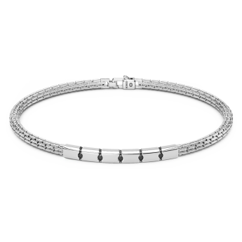 Pulsera Zancan de plata con placa y piedras negras.