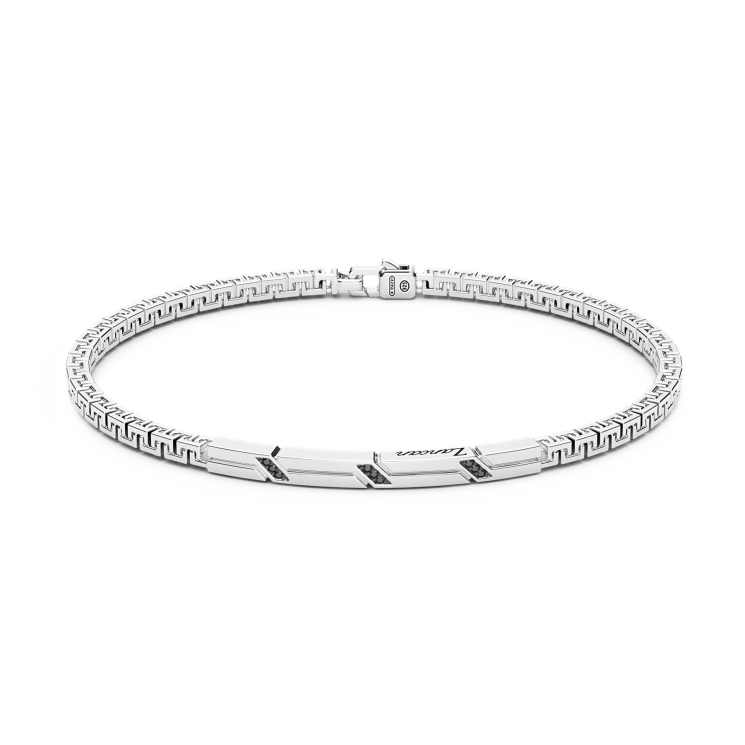 Zancan silver bracelet with tag and black stones.