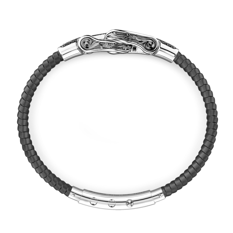 Pulsera Zancan de silicona con placa de plata y piedras negras.