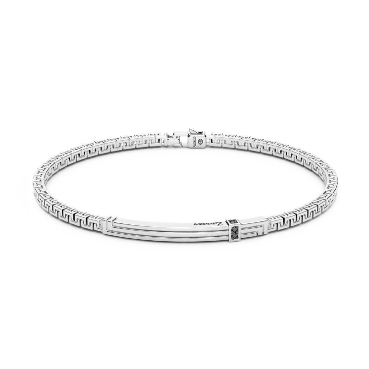 Pulsera Zancan de plata con placa y piedras negras.