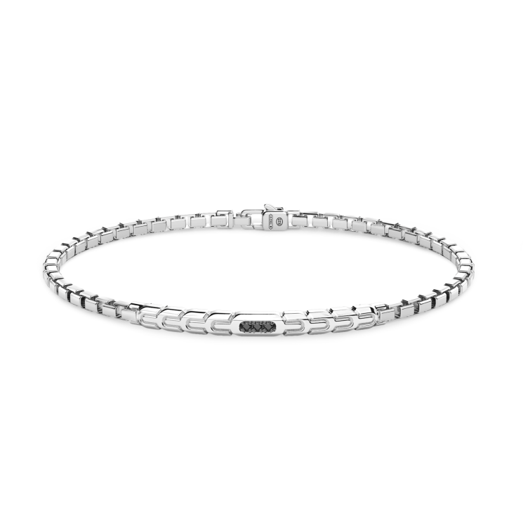 Pulsera Zancan de plata con placa y piedras negras.