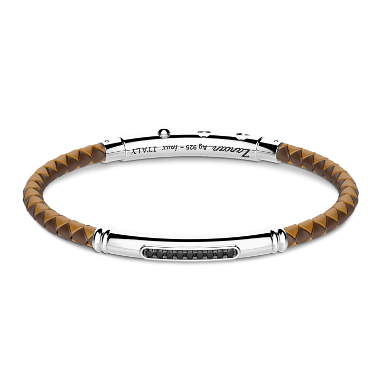 Zancan-Armband aus Silikon mit Silberplakette und schwarzen Edelsteinen.