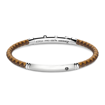 Zancan silicone bracelet with silver tag and black stone.