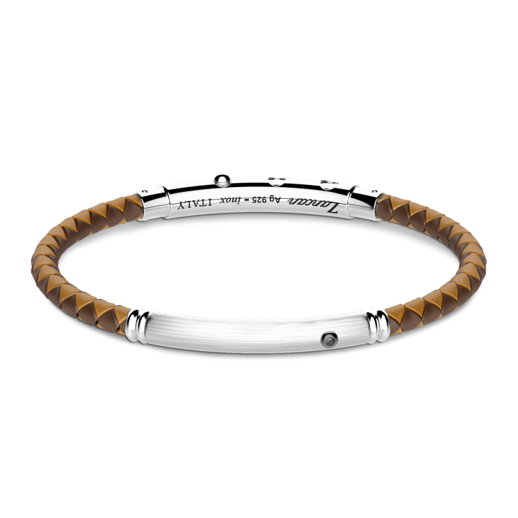 Pulsera Zancan de silicona con placa de plata y piedra negra.