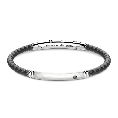 Zancan-Armband aus Silikon mit Silberplakette und schwarzem Edelstein.