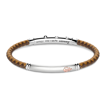 Pulsera Zancan de silicona negra con placa de plata y detalles de oro rosa.