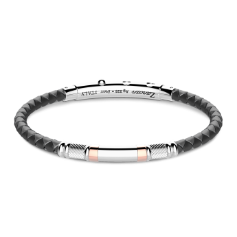 Pulsera Zancan de silicona negra con placa de plata y detalles de oro rosa.