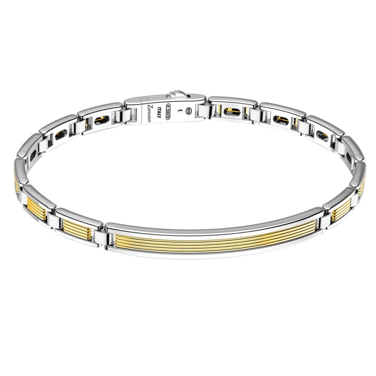 Bracciale in oro ed argento con placca.