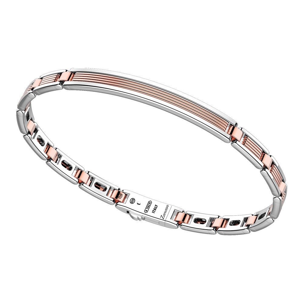 Bracciale in oro ed argento con placca.