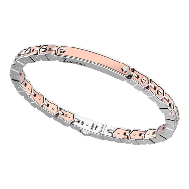 Bracciale in oro ed argento con placca.