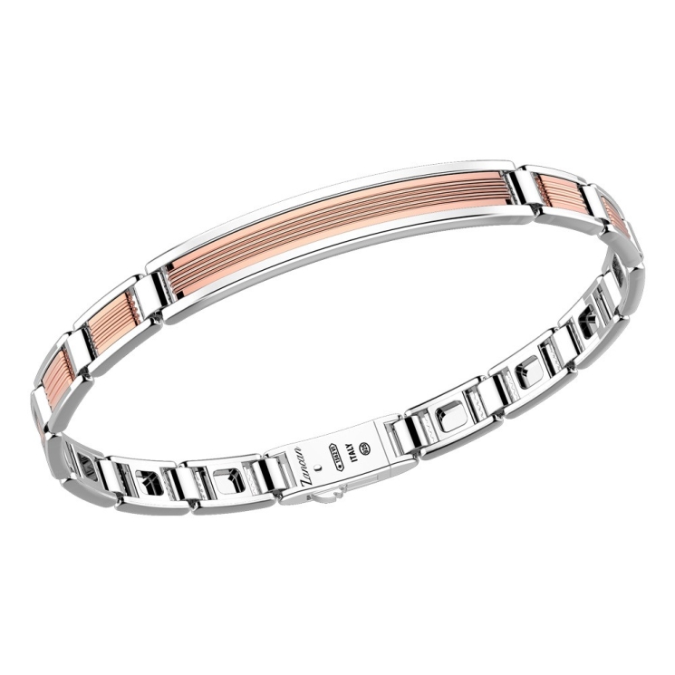 Bracciale in oro ed argento con placca.