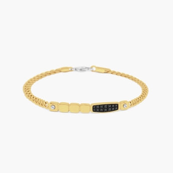 Bracciale in oro giallo con motivo geometrico.