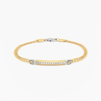 Bracciale da uomo in oro giallo con piastra centrale in diamanti bianchi.