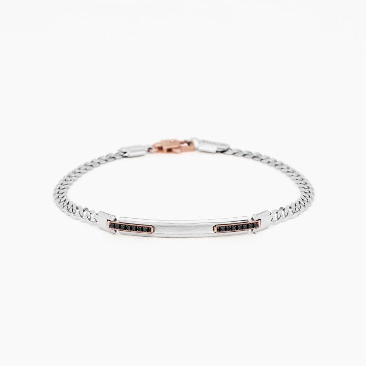 Bracciale da uomo in oro bianco con piastra centrale e diamanti laterali neri.