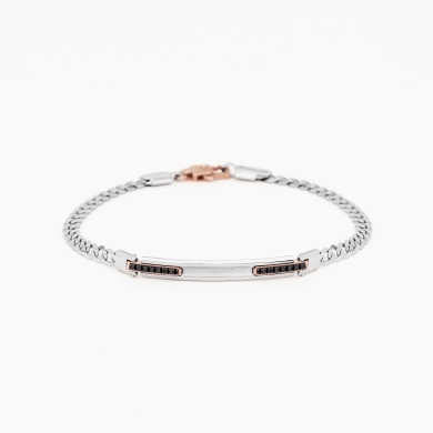 Bracciale da uomo in oro bianco con piastra centrale e diamanti laterali neri.
