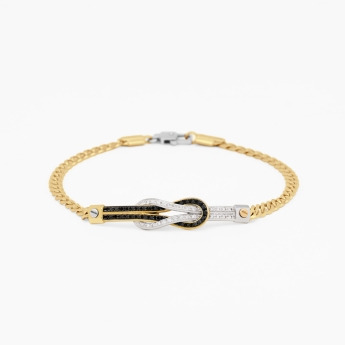 Bracciale da uomo in oro giallo con nodo nautico centrale.