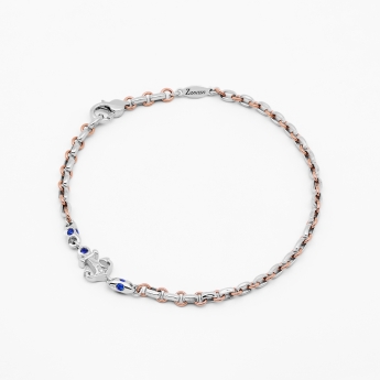 Bracciale da uomo in oro bianco e, dettagli in oro rosa.