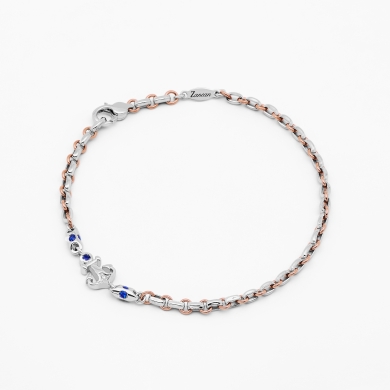 Bracciale da uomo in oro bianco e, dettagli in oro rosa.