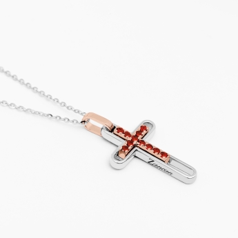 Collana da uomo con pendente a croce tempestata di rubini.
