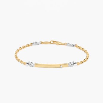 Bracciale da uomo in oro giallo con nodo nautico centrale.