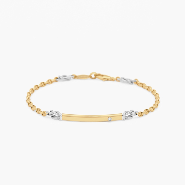 White gold bracelet, plate in the middle with white diamond.