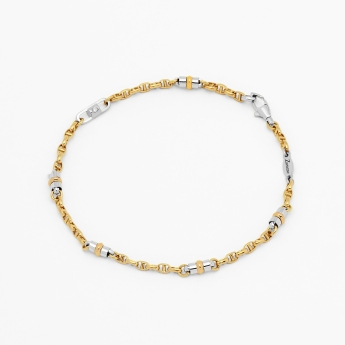 Bracciale in oro bianco e dettaglio in oro giallo.