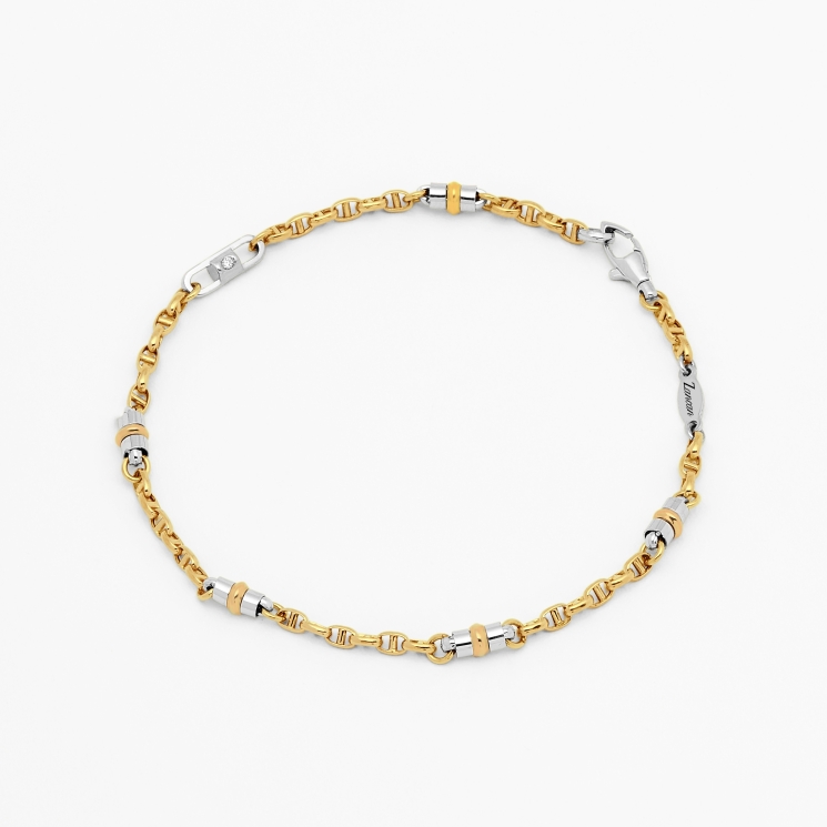 Bracciale in oro bianco e dettaglio in oro giallo.