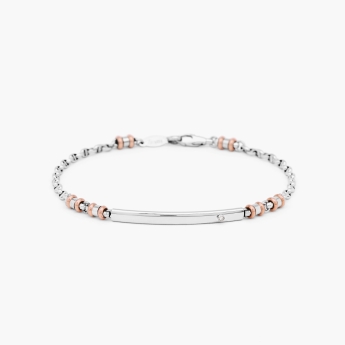 Bracciale in oro bianco con piastra centrale in oro bianco e diamante.