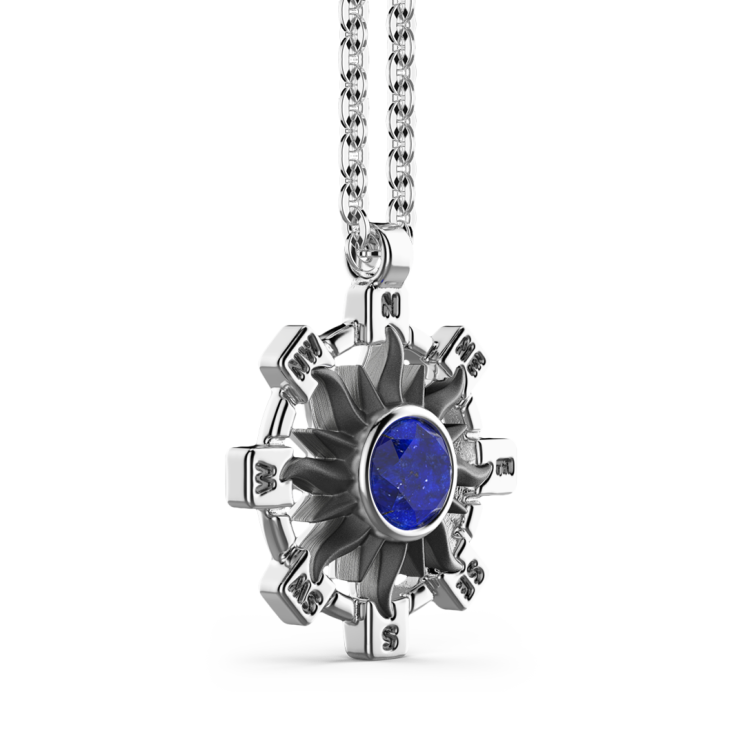 Zancan silver necklace with sun pendant and blue stone.