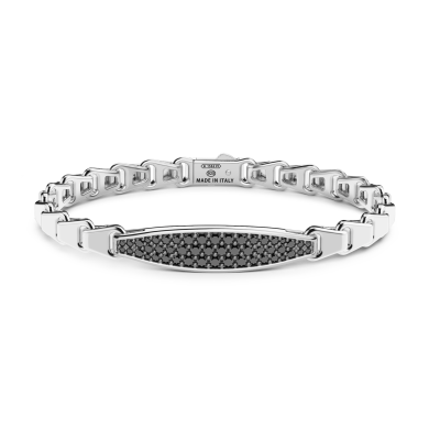 Pulsera Zancan de plata con placa y piedras negras.