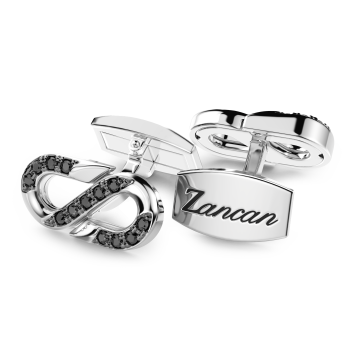 Gemelli Zancan in argento con pietre nere.
