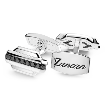 Gemelos Zancan de plata con piedras negras.