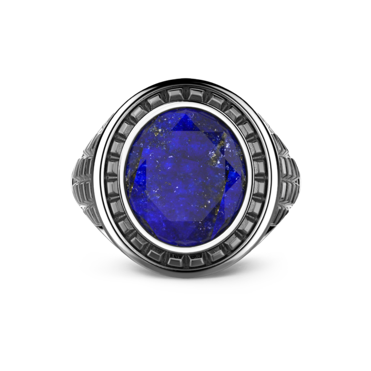 Anillo Zancan de plata con piedra azul.