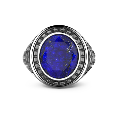 Anillo Zancan de plata con piedra azul.