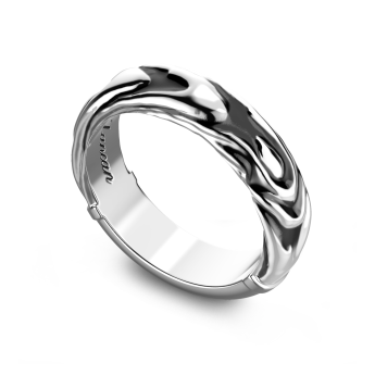 Anello in argento con superficie irregolare. 2