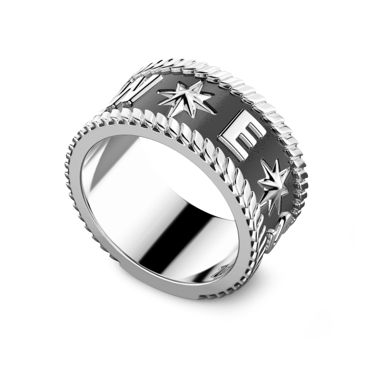 Zancan silver band ring with cardinal points.