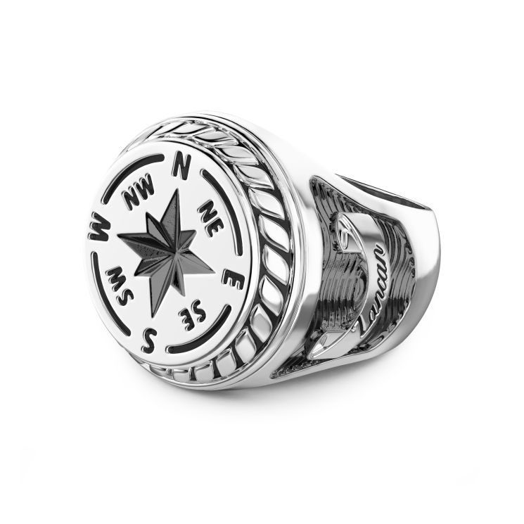 Anillo Zancan de plata con rosa de los vientos grabada.