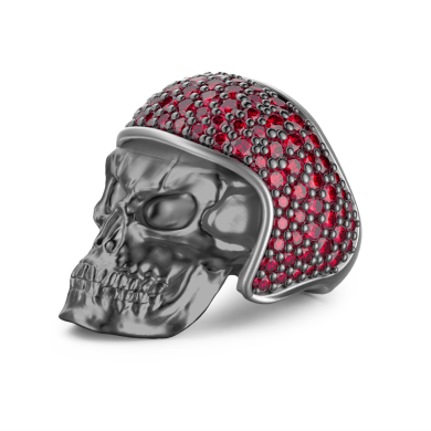 Zancan burnished silver biker skull ring with red stones.