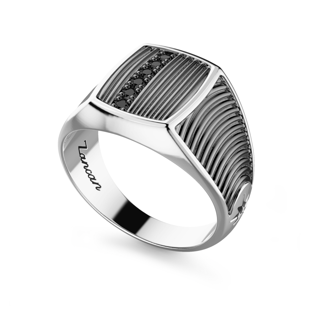 Zancan burnished silver and black stone signet ring.