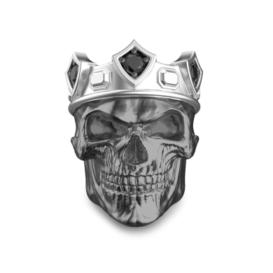 Anillo con calavera de rey Zancan de plata con piedras negras.