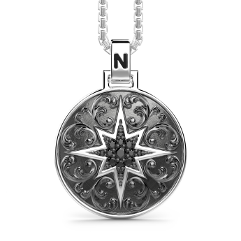 Zancan silver necklace with wind rose pendant and black stones.