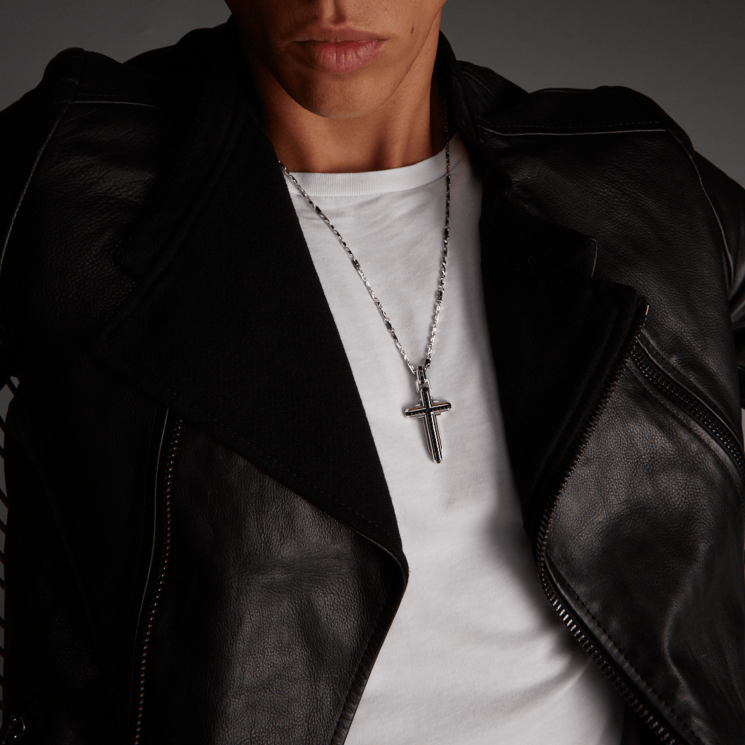 Zancan silver necklace with cross pendant and black stones.