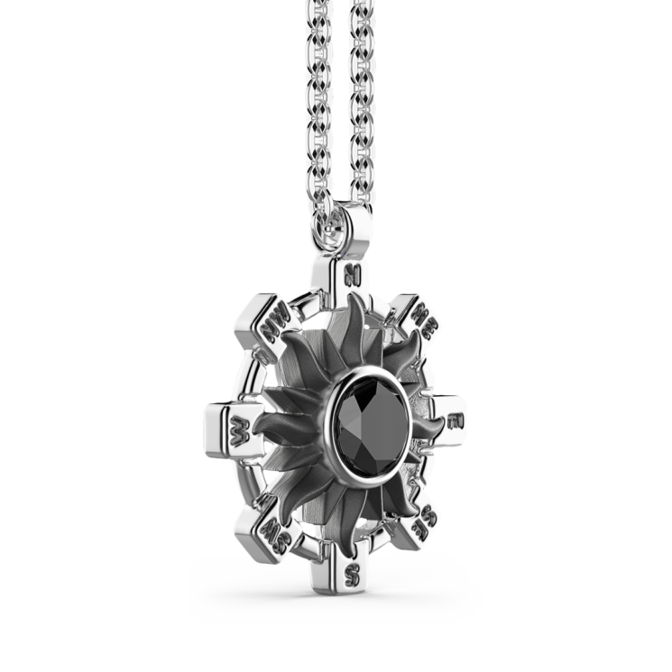 Zancan-Kette aus Silber mit Sonnenanhänger und schwarzem Edelstein.