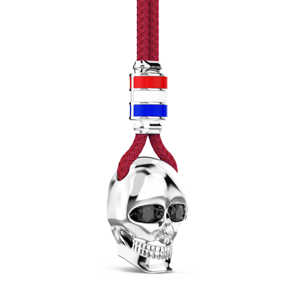 Collar Zancan de kevlar con colgante de calavera de plata.