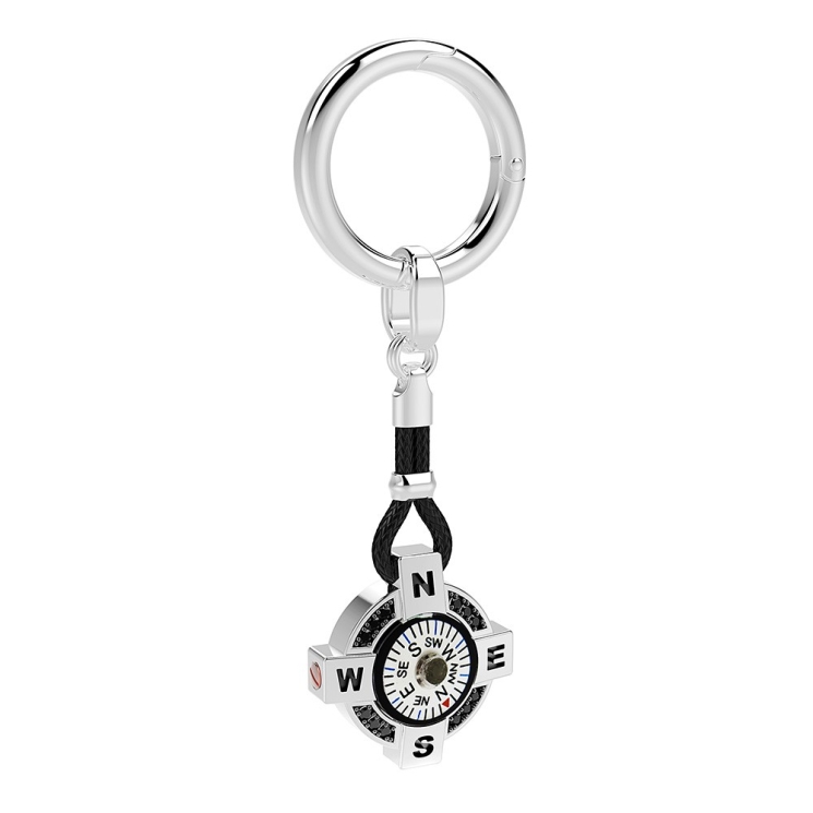 Zancan silver keychain with white compass.